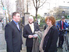 Members of ICTE distributing their information leaflet. From left: Colm Mac Cártaigh, Cian Synnott, Margaret McGaley