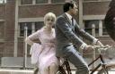 Catherine Deneuve on bicycle